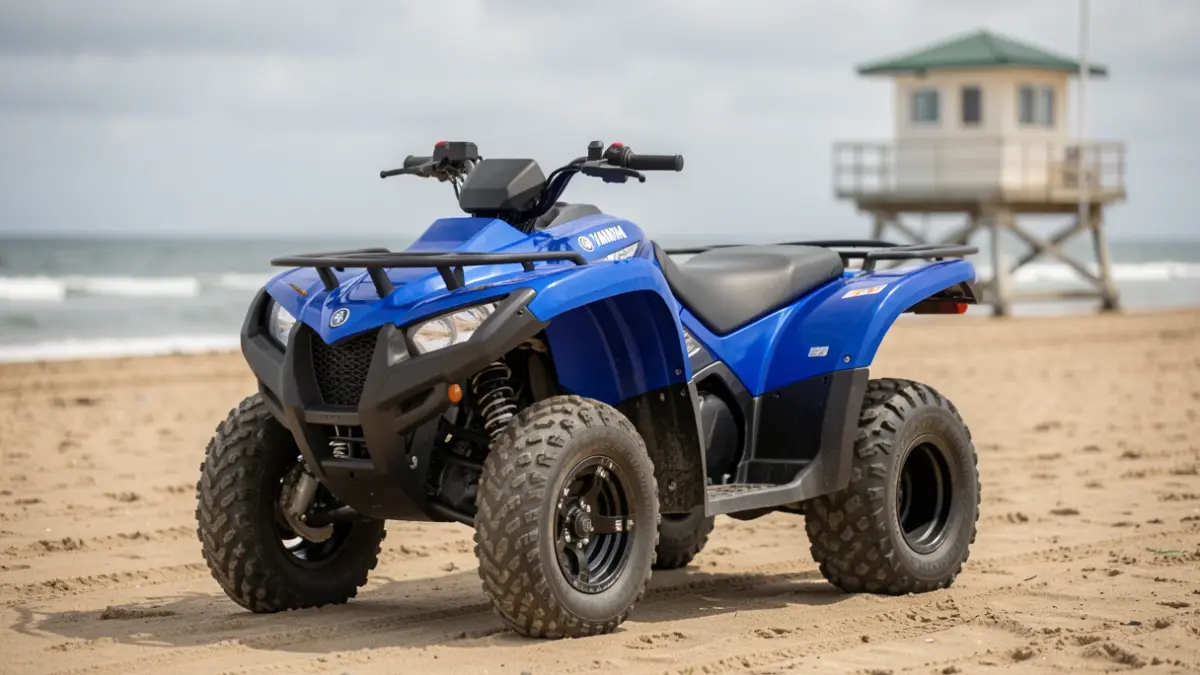 Generic image of a blue quad bike on a beach.