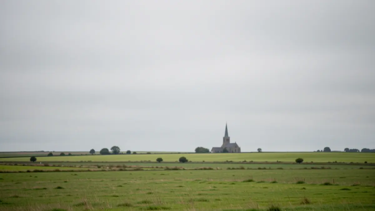 A typical East of England landscape with wide skies and fields.